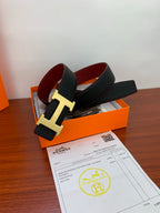 Reversible leather belt with dark strap and gold-toned H buckle