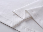 White T-shirt hem and side seam detail