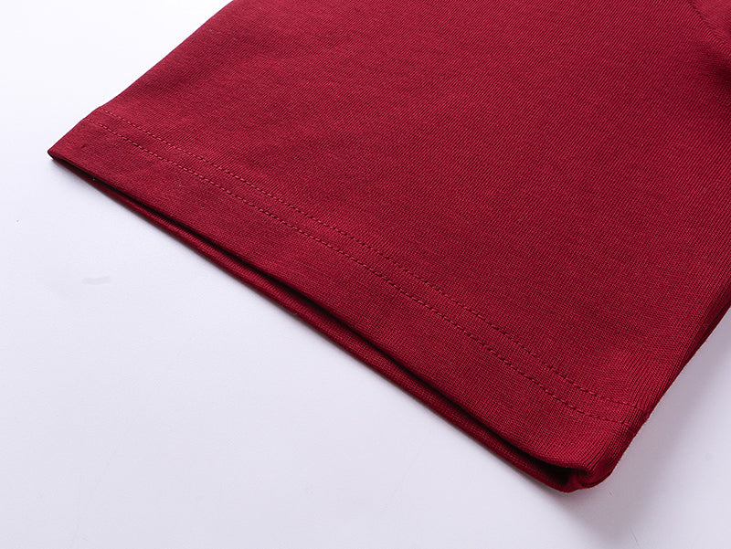 Burgundy Gucci T-shirt hem with stitched seam