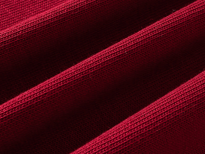 Burgundy fabric close-up with knit texture