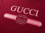Burgundy Gucci T-shirt chest graphic with GUCCI text and GG emblem