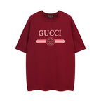 Burgundy Gucci T-shirt with large “GUCCI” graphic and GG emblem at chest