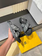 Fendi FF slide sandals, side view with thick sole and crossover strap
