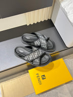 Fendi FF slide sandals with cross straps and branded black footbed