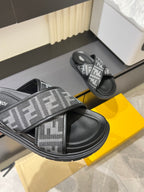 Fendi FF slide sandal close-up with wide strap and textured rubber sole