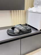 Fendi FF slide sandal with wide crisscross straps and thick rubber sole