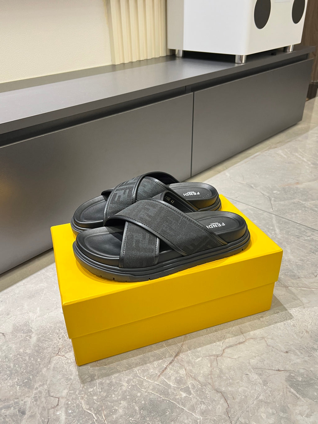 Gray logo slide sandals with thick sole and crossed straps