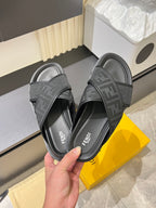 Gray slide sandals with F-style logo straps and cushioned sole