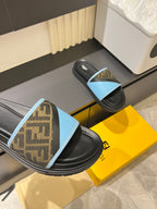 Fendi slide sandals: blue FF strap on black sole