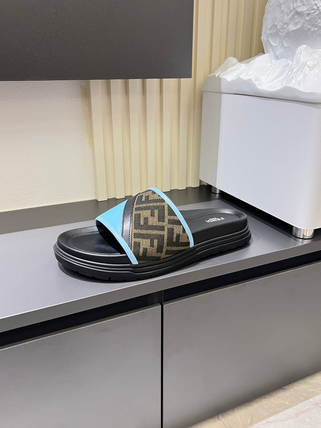 Fendi slide sandals with light blue edge-trimmed FF band on black sole