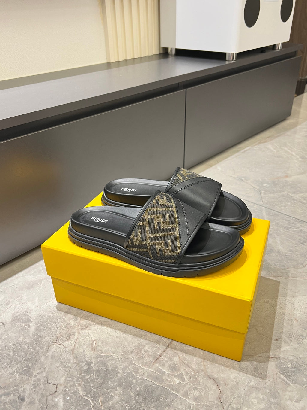 Fendi slide sandals with FF monogram strap and black footbed