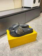 Fendi slide sandals with FF monogram strap and black sole
