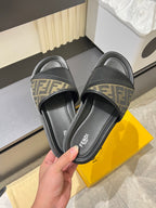 Fendi slide sandal, black leather with FF monogram straps at top