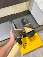 Fendi slide sandals, dark sole with tan FF logo strap and tan foot strap edge