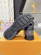 Louis Vuitton sneaker soles and logo tread, dark gray/black pair on box