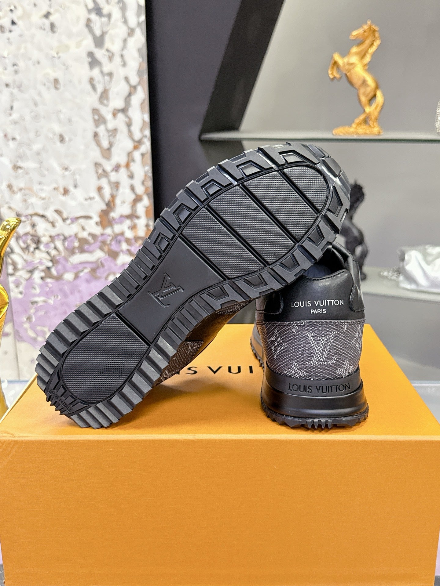 Louis Vuitton sneaker soles and logo tread, dark gray/black pair on box