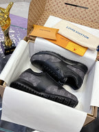 Louis Vuitton lace-up sneakers in dark gray/black monogram print, on gift box