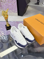 Louis Vuitton ladies sneakers pair, white leather with navy monogram toe and side panels
