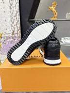 Louis Vuitton sneakers heel and outsole view, black tread with white rubber