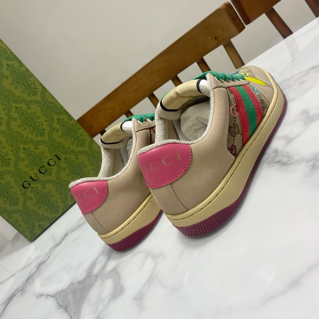 Gucci unisex sneakers, beige with pink heel tabs and green laces, multicolor stripe panel