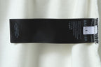 Balenciaga shorts fabric label stitched near the hem with care tag