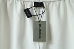 Balenciaga shorts with hang tags and elastic waistband shown at top