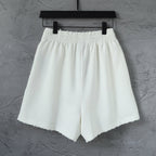 Balenciaga shorts with elastic waistband and subtle pleats at the front