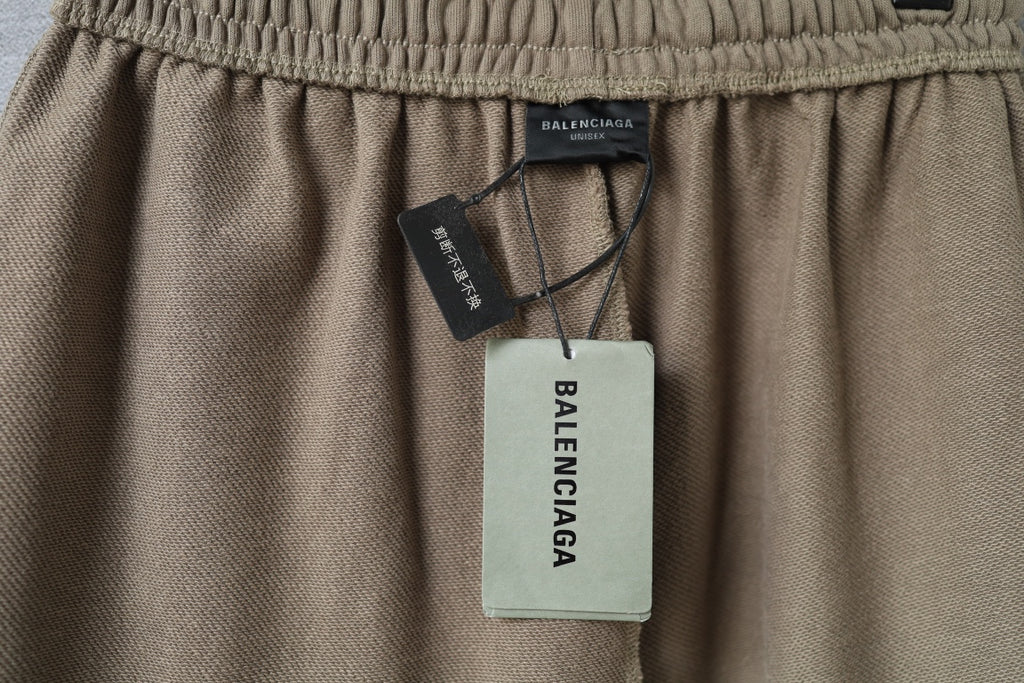 Balenciaga taupe shorts with interior brand label and hanging tags