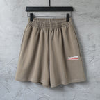 Balenciaga taupe cotton shorts with elastic waistband and embroidered logo patch