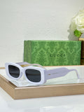 Gucci sunglasses with white frames and dark rectangular lenses