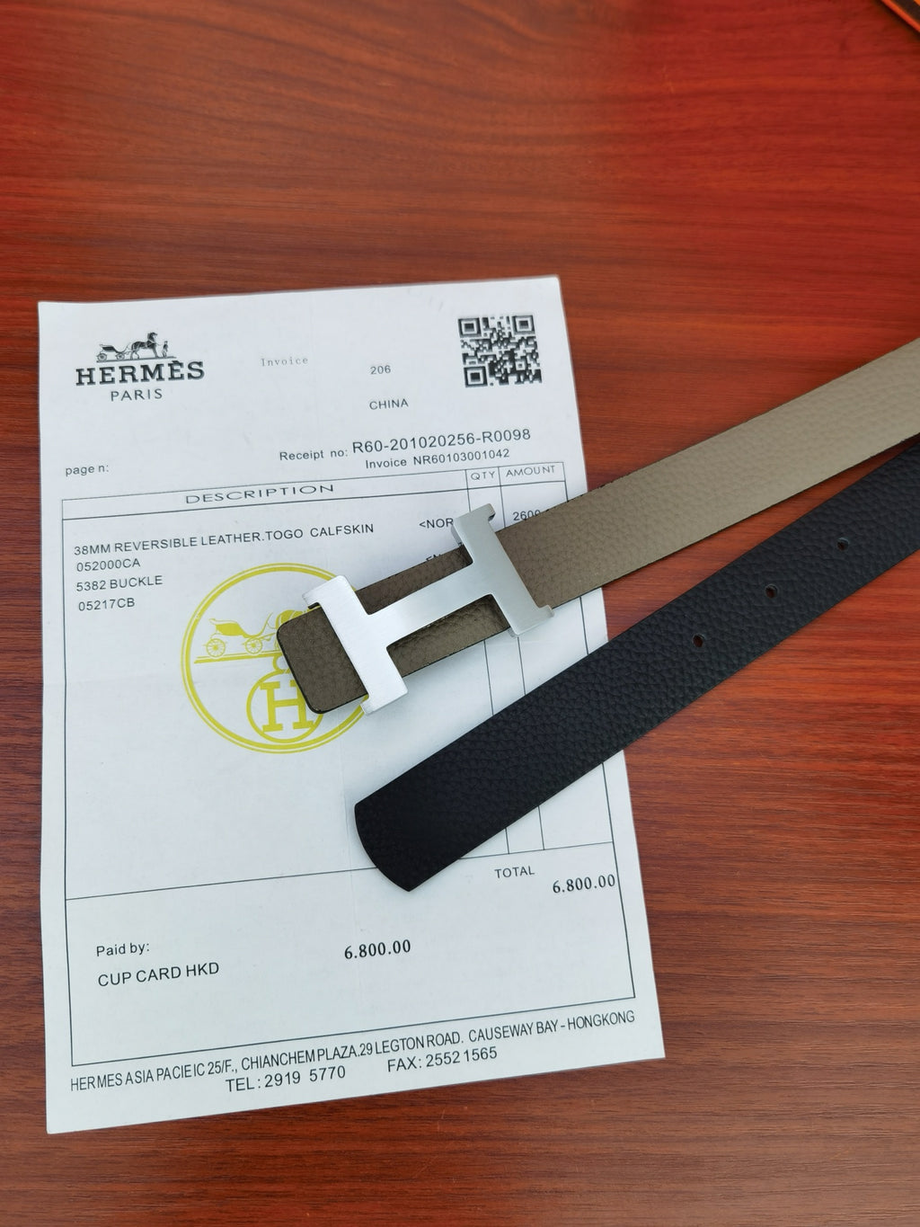 Hermes belt with dark and light gray straps and gold-tone H buckle