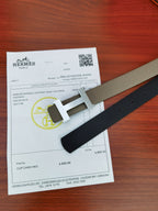 Hermes belt with dark and light gray straps and gold-tone H buckle