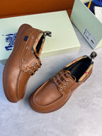 Burberry brown leather lace-up boat shoes with checkered collar detail and rounded moc toe