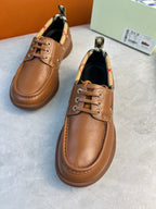 Burberry brown leather lace-up boat shoes with checkered tongue lining and metal eyelet laces