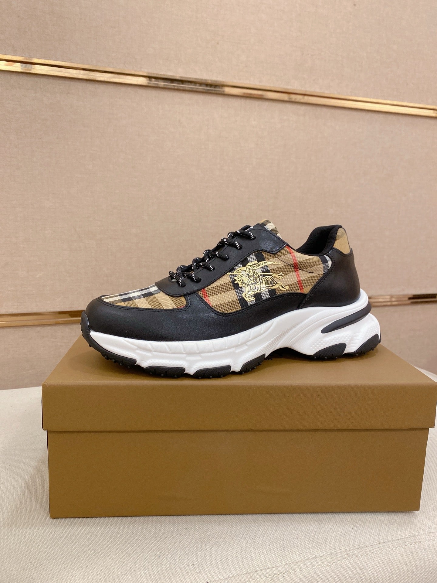 Burberry lace-up sneakers, black with plaid paneling and chunky white sole