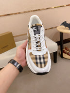 Burberry luxury sneakers close-up, white laces and plaid side panel