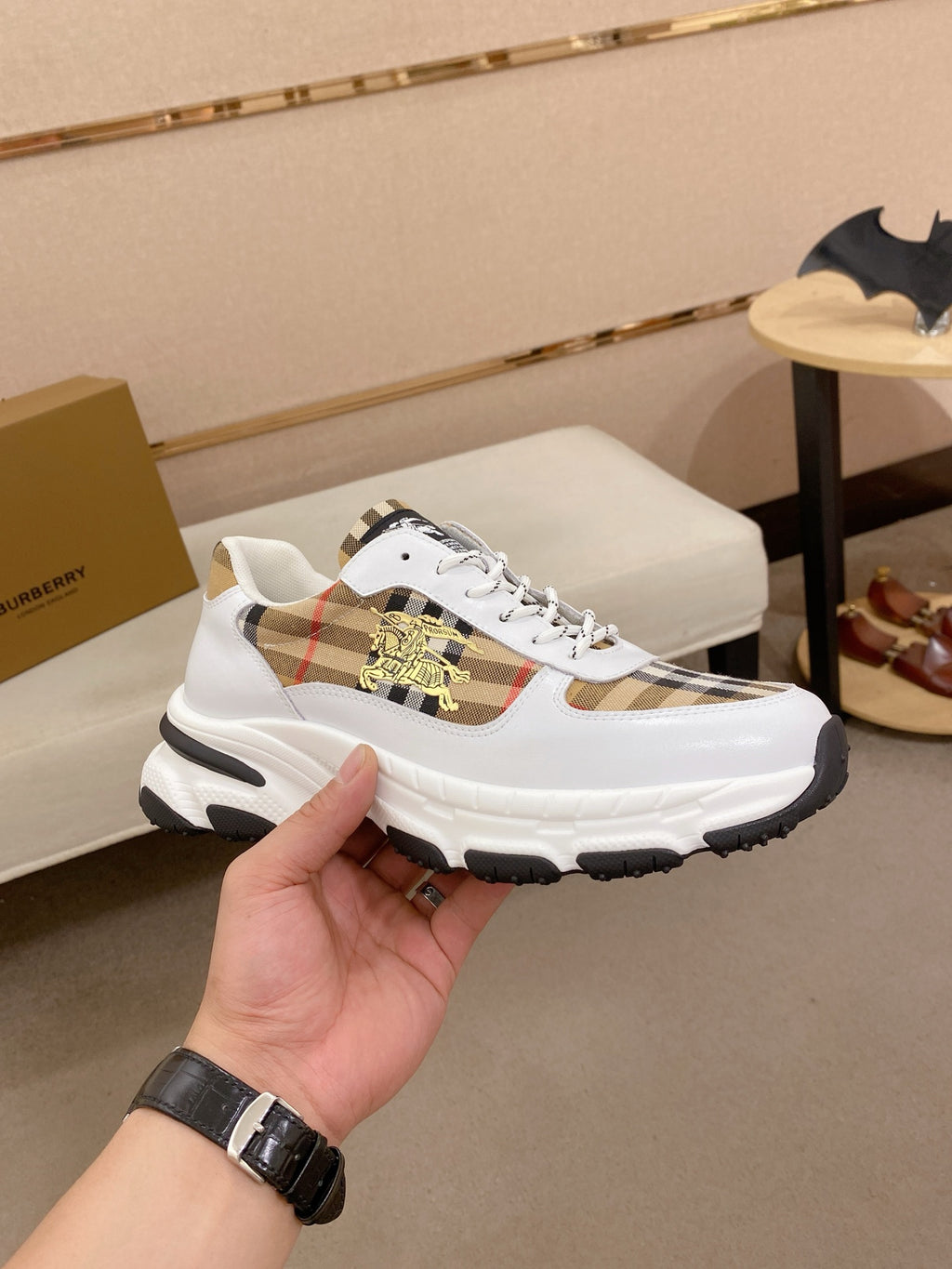 Burberry luxury sneaker, white leather with plaid stripe and gold emblem