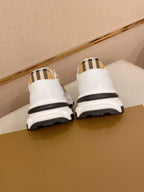 Burberry luxury sneakers heels, white back with plaid tabs and black tread
