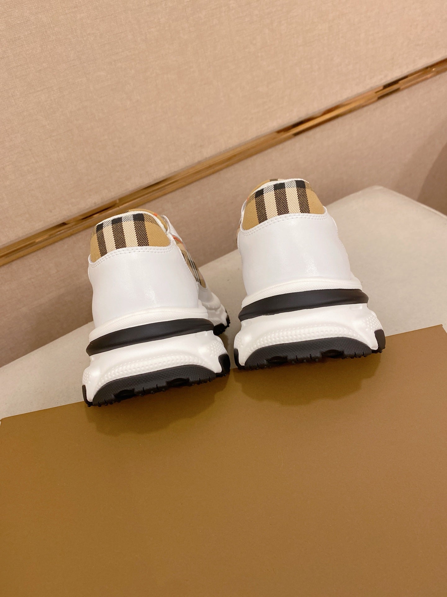 Burberry luxury sneakers heels, white back with plaid tabs and black tread