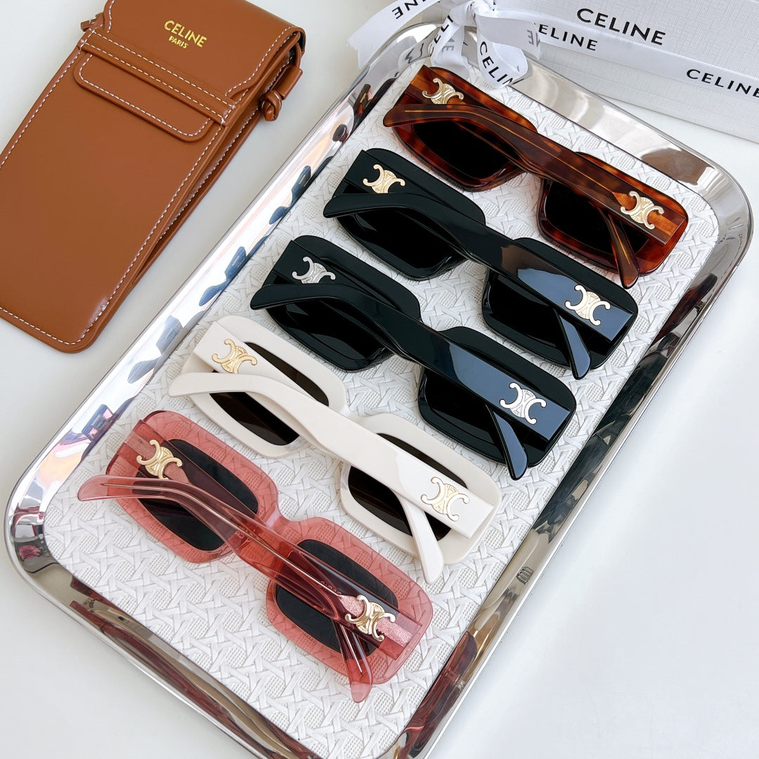 Assorted square sunglasses set in a clear case, showing black, white, and tortoise frames
