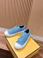 Fendi unisex sneakers, light blue suede with white rubber soles and blue lace-up tops