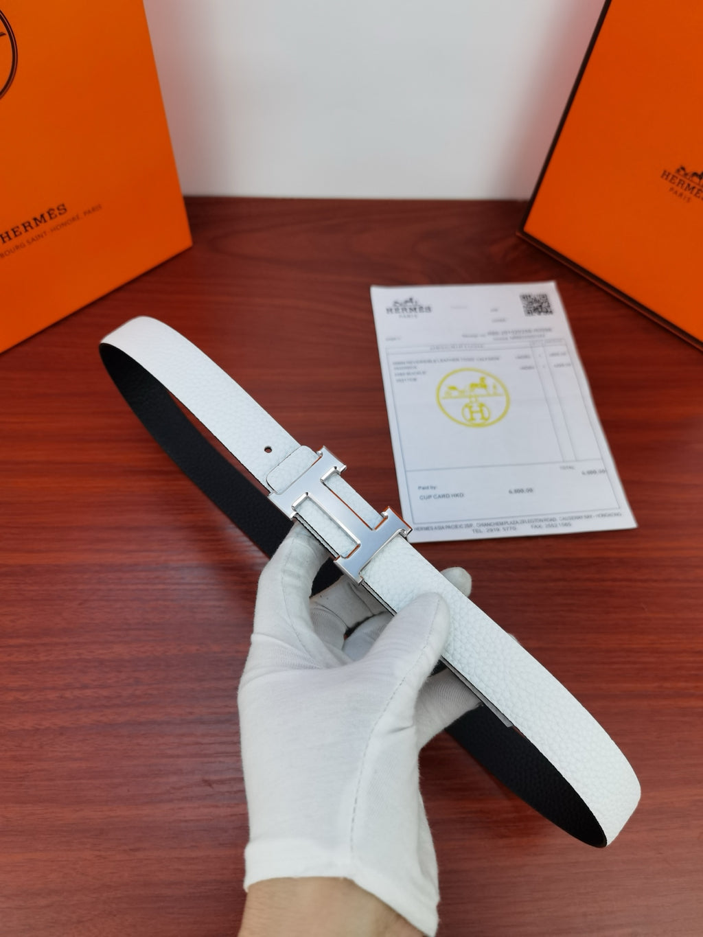 Hermes belt in light white leather with silver buckle and punched holes
