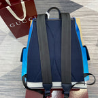 Gucci men’s backpack back view with black shoulder straps and blue textured panel