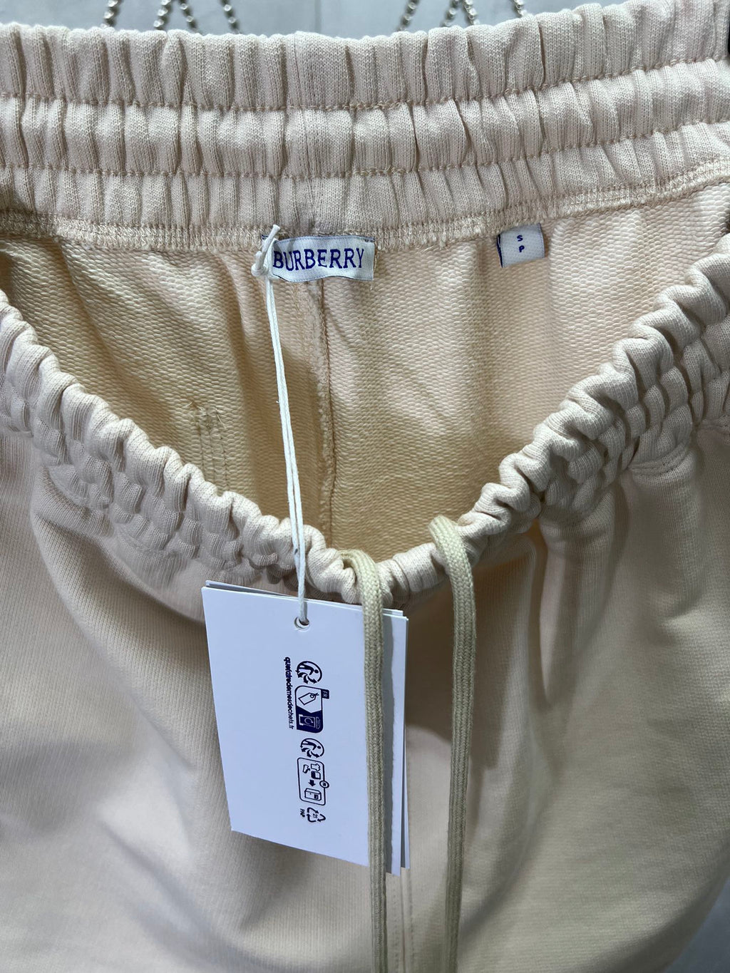 Cream shorts with Burberry label and drawstring waistband