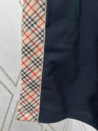 Navy shorts with plaid side panel trim
