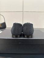 Women’s Chanel dark gray knit flat heels, rear view with low stacked heel