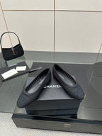 Women’s Chanel dark gray knit slip-on flats on a box, round toe and low heel