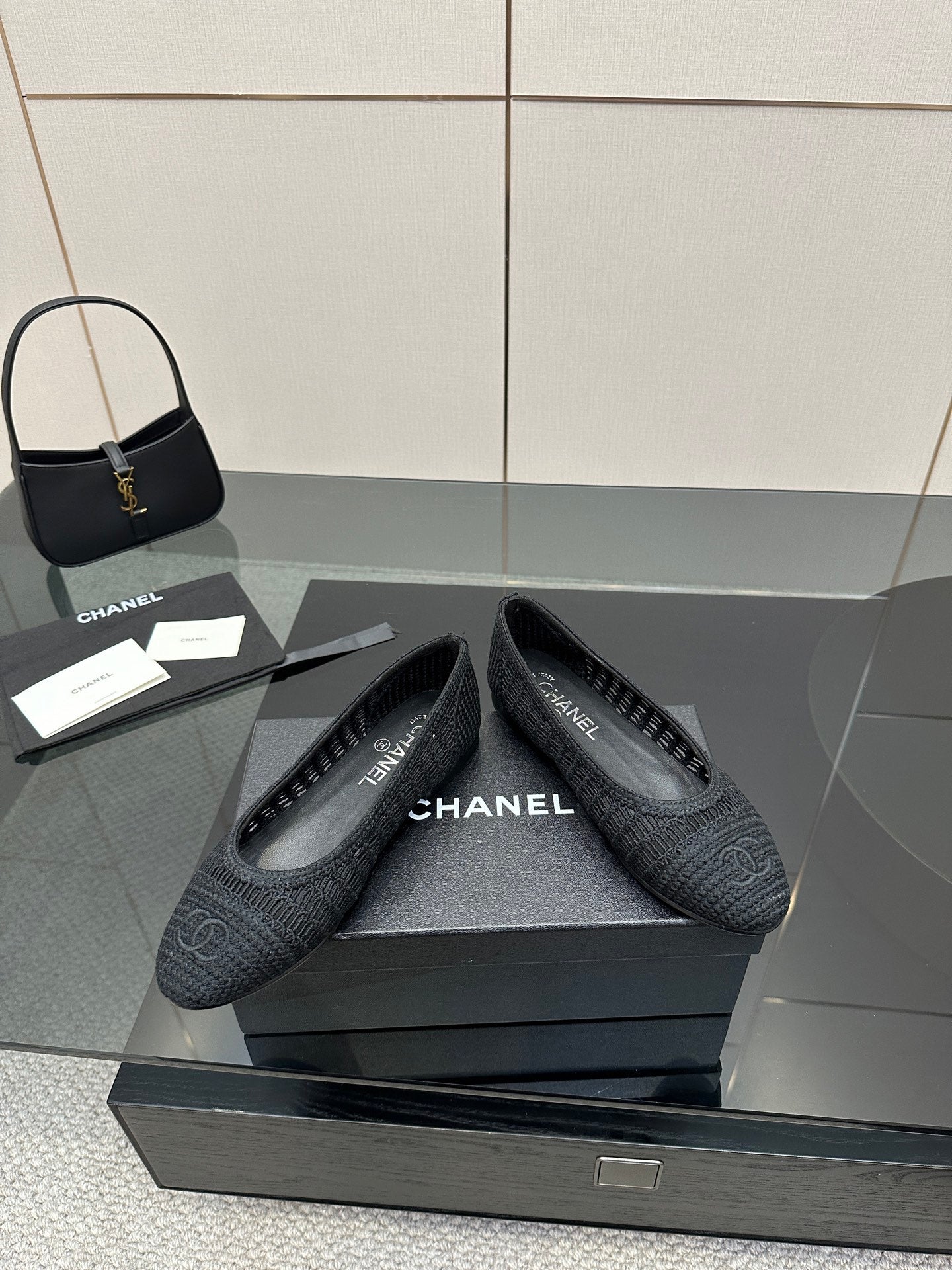Women’s Chanel dark gray knit slip-on flats on a box, round toe and low heel