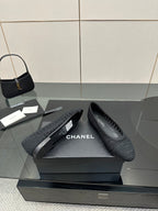 Women’s Chanel dark gray knit ballet flats pair on box, slip-on style