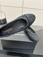 Women’s Chanel dark gray knit flat with CHANEL logo on insole, round toe